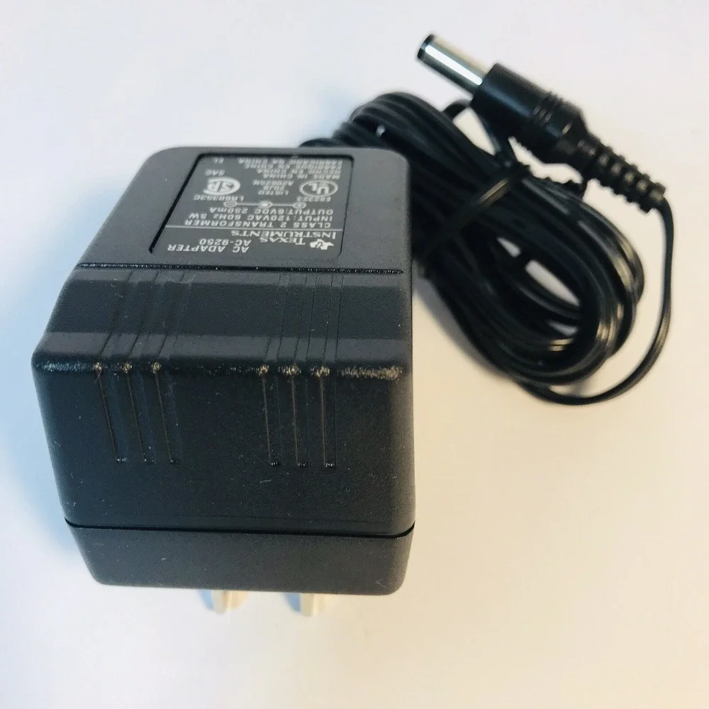 Used OEM Texas Instruments TI - AC-9250 - 6V DC - 250mA‎ AC Adapter Plug